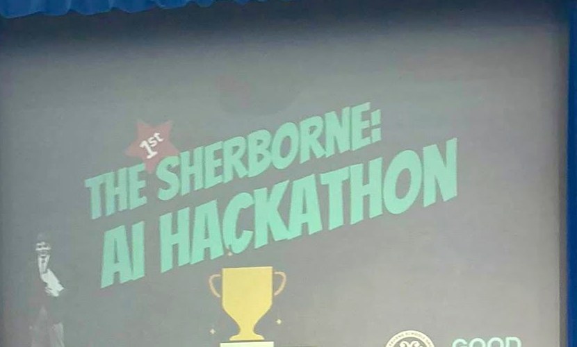Sherborne AI Hackathon title projected on the school hall screen